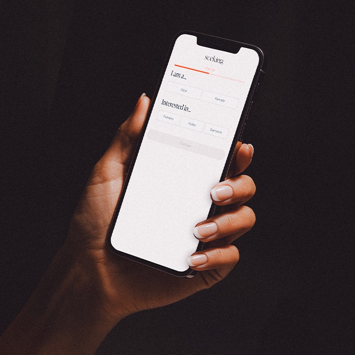 Someone signing up for Seeking using their mobile phone